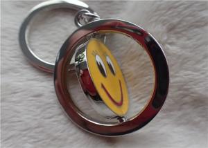Cheap Color Silver Key Chain Personalized Promotional Gifts With Rotatable Smiling Yellow Face for sale