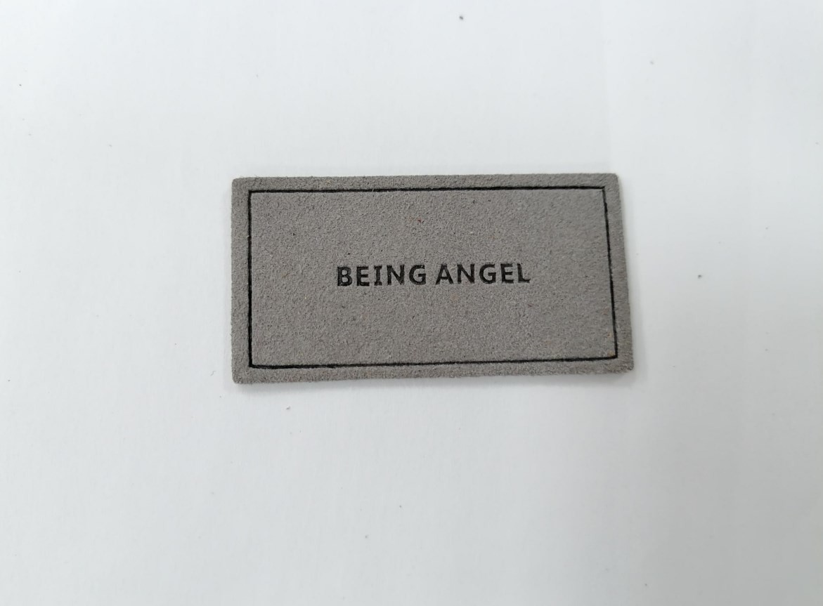 Cheap Microfiber Embossed Logo PU Leather Label Sew On Clothing Customize Design for sale