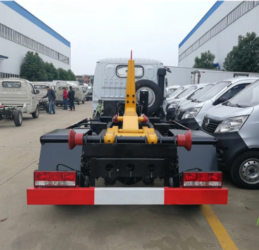 Cheap SINOTRUK HOWO 4x2 Hook Arm Roll Off Garbage Truck for Container Loader 4CBM-10CBM for sale
