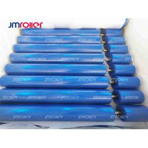 Wear resistant return roller conveyor component for stable belt support