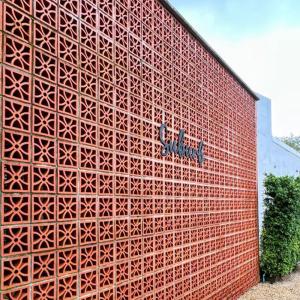 China Artistic Courtyard Exterior Latest Modern Wall Design Clay Hollow Breeze Block Facade Block on sale