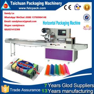Horizontal packaging machine for sponge , scourer, foam, baorbent cloth