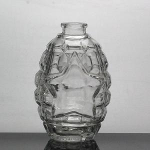 Customized Surface Handing Football Shaped Glass Bottle for Unique Alcohol