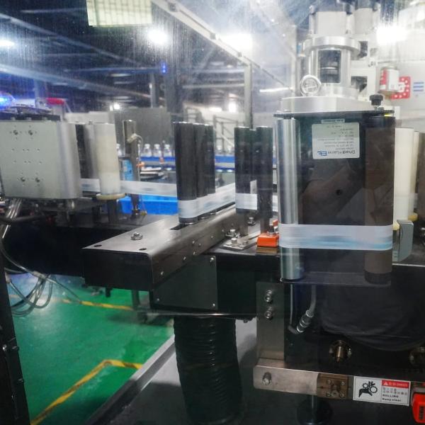 16,000 Bph Full Automatic Mineral Water End of Line with Hot Melt Adhesive