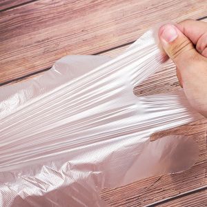 China Disposable Embossed Plastic Transparent Polyethylene PE Gloves on sale