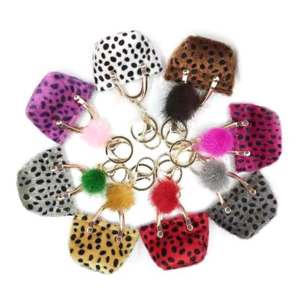 Quality CE 7.7x5CM Mini Coin Purse Keyring , Spot Printed Pom Pom Bag Keychain wholesale