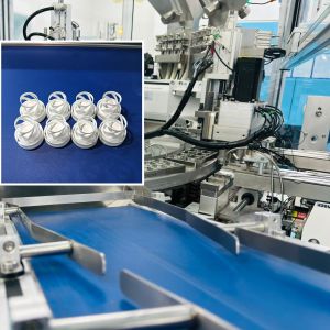 Spring-loaded desiccant cap automated assembly machine for effervescent tablets, customized to customer requirements