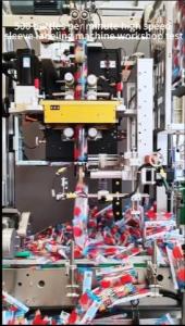 Cheap Fifth Generation Fully Automatic Shrink Sleeve Applicator Customized For 30000BPH Drinks Production Line Is Being Tested In The Workshop for sale