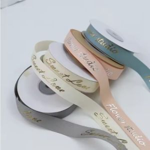 China Customized Grey Shiny 3D Foil Printing Polyester Grosgrain Ribbon for Gift Packaging on sale