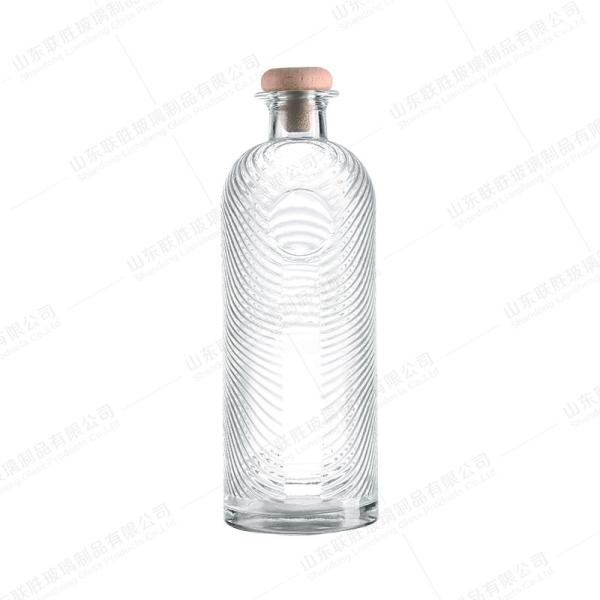 Exquisite Carved Exterior Glass Bottle with Customizable Logo and Transparent