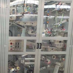 Full Servo CE Certificate Sanitary Napkin Making Machine Engineers Oversea