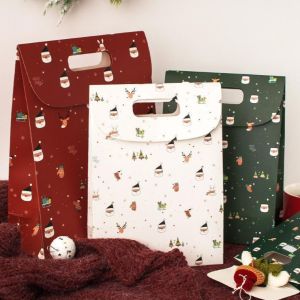 China Festive Paper Gift Bags With Handles For Christmas Candy And Small Gifts Custom Logo on sale