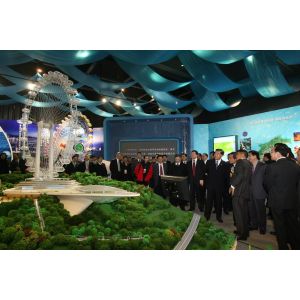 Architectural Model of Futuristic Glass Skyscraper with Illuminated Facade and