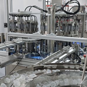 Cheap Low Noise And Smooth Mechanical Double Folding Cover Assembly Machine For Plastic IV Infusion Bags And Bottles With High Capacity Servo Motor for sale