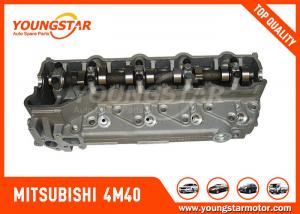 China High Performance Complete Cylinder Head Mitsubishi 4M40 With Bigger Exhaust Ports on sale