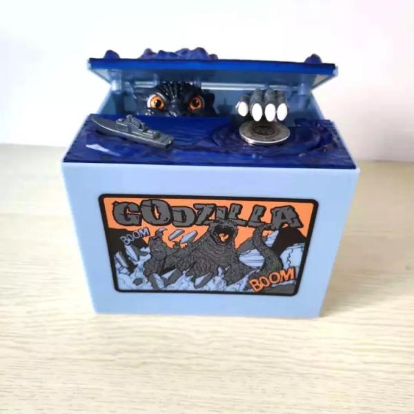 Quality Godzilla Monster Dinosaur Moving Musical Electronic Coin Piggy Bank For Children wholesale