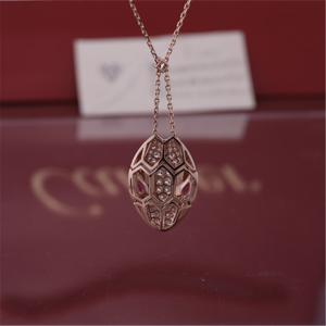 Roman Serpenti necklace in 18 kt rose gold set with rubellite eyes and with pavé