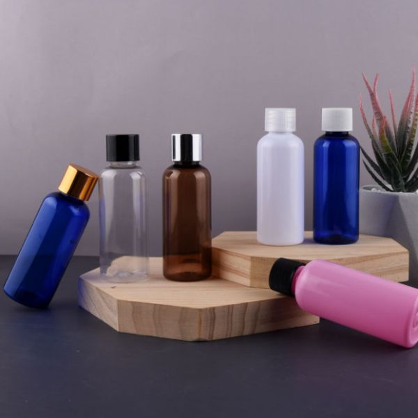 Quality 100ML PET Plastic Bottles Clear Cosmo Round Bottles With Natural Disc Top Caps wholesale