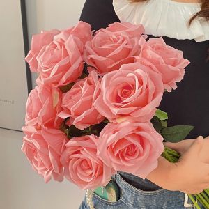 A single broken ice blue rose with a realistic touch for Valentine's Day home decoration shoot, featuring Ecuadorian roses