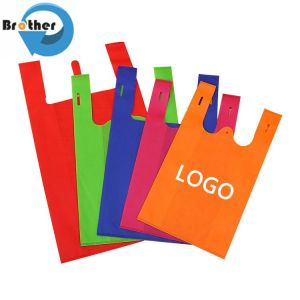 China Biodegradable Cheap Eco-Friendly Reusable W Cut T Shirt Vest PP Non Woven Supermarket Tote Grocery on sale