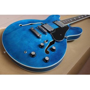 High quality electric guitar in blue color hollow body with chrome hardware