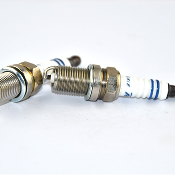 Why is the spark plug of champion motorcycle so cheap?