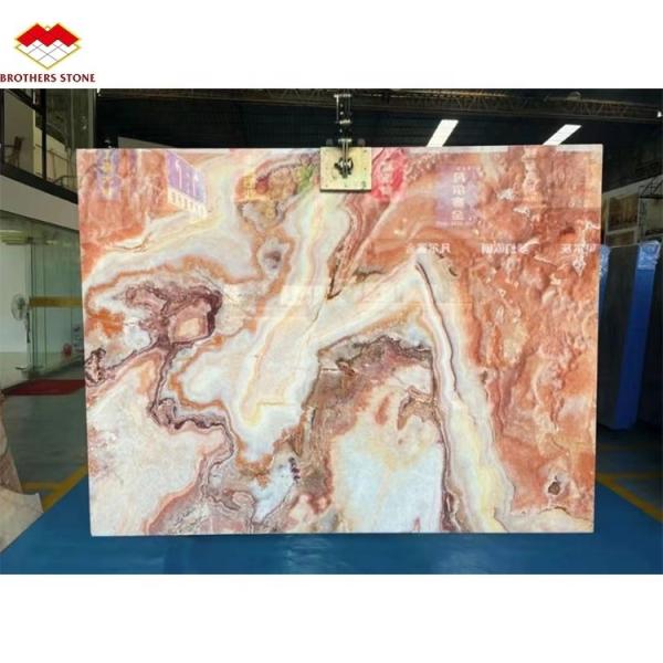 Quality Backlit Red Onyx Marble Stone Book Matched Slab for Transparent Marble Table Pattern wholesale