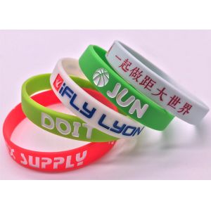 China Hand Strap Luminous Silicone bracelet Recessed wrist Rubber strap custom OEM logo words color size wrist on sale
