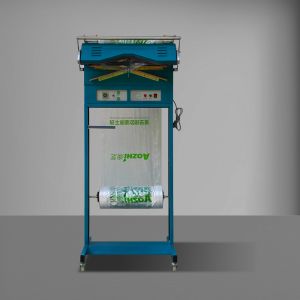 China Dry Cleaning Shop Garment Suit Packing Machine Clothes Packaging and Sealing Machine on sale