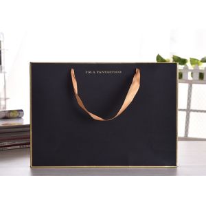 China Luxury gift kraftpaper bag with silk ribbon handle on sale