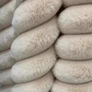 China Orange Cream Fluffy Fabric Material Blanket Fuzzy Upholstery Fabric on sale