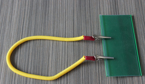 Custom yellow color spring coiled lanyard tether with silver metal thin clip for