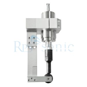 Ultrasonic slitting of fabric rolls for polyster and non-woven fabric