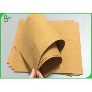 China Durable 0.55mm Thickness Brown Prewashed Kraft Fabric Material For Bags on sale