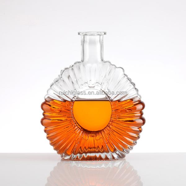 Quality Super Flint Glass Most Popular Style Flat Mouth Embossed Brandy Glass Bottles wholesale