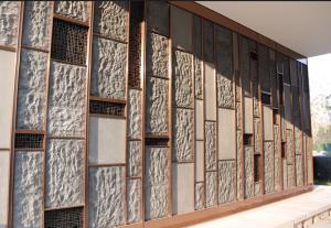 China Faux Stone Wall Cladding And Installed Within Stainless Steel Frame Surrounded on sale