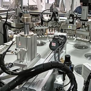 Cheap Customised Indexed Motion Heli Cap Assembly Machine With Easy To Use Touch Screen Operation for sale