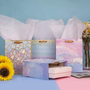 Designer Folding Glossy Shopping Paper Bag With Ribbon Handle and Gravure