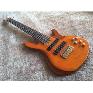 6 string bass guitar JP2 yellow quilted maple body back and front Active pickups Golden bridges and tuner Alder with ebo