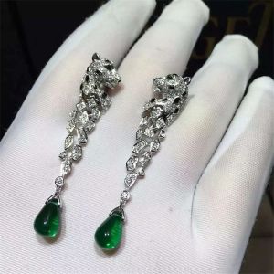 China C Cheetah Earrings - showing the charm of courage, naughty or docile .310 round bright cut diamonds, emerald and onyx. on sale