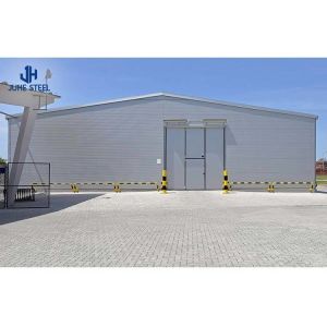 Prefabricated Light Weight Workshop with Rolling Door and Solid H-shape Steel