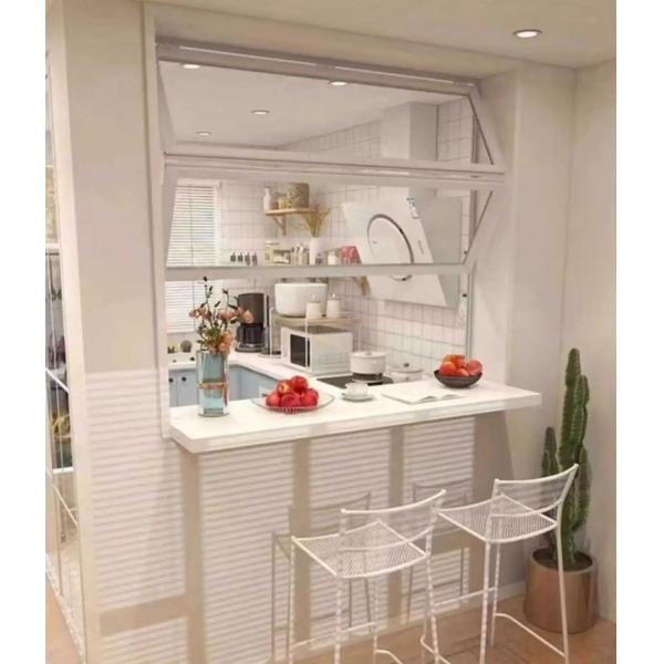 View Alpine Cabin Folding Window Framing Vertical Cliff Faces and Eagle Nesting