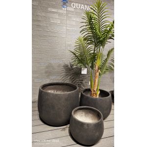 China Timeless Modern Style Black Round Fiber Clay Planter Smooth Matte Pattern on sale