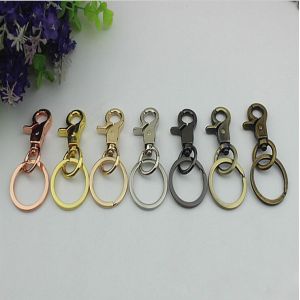RLOVE design zinc alloy 18 mm spring trigger rose gold metal snap hook with key