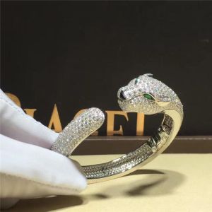 C Cheetah bracelet - showing the charm of courage, naughty or docile .18K gold