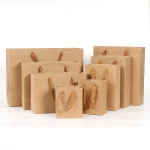 China Antiwear Moistureproof Kraft Paper Gift Bags With Handles Multipurpose on sale
