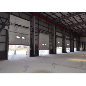 China Vertical Lift Industrial Sectional Door Windproof Multipurpose on sale