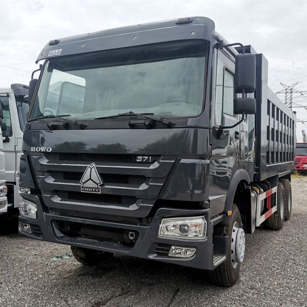 Customized iron can hall 14000 lb electric brakes on both axels 2 5/16 ball hook up 235R16 tire tipper dump farm trailer truck