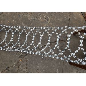 China Strong Defensive Galvanized Razor barbed wire Roll for Secure Boundaries on sale