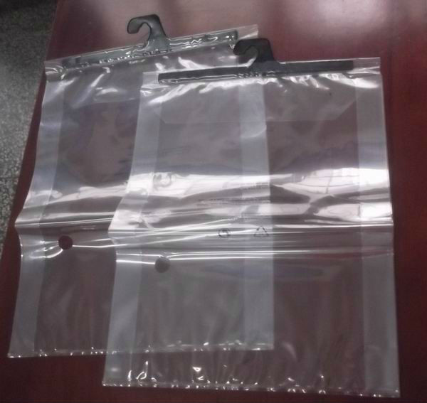Quality Plastic Clear Grip Seal Colthes Packaging Pouch With Hanger / Sliding Zipper wholesale